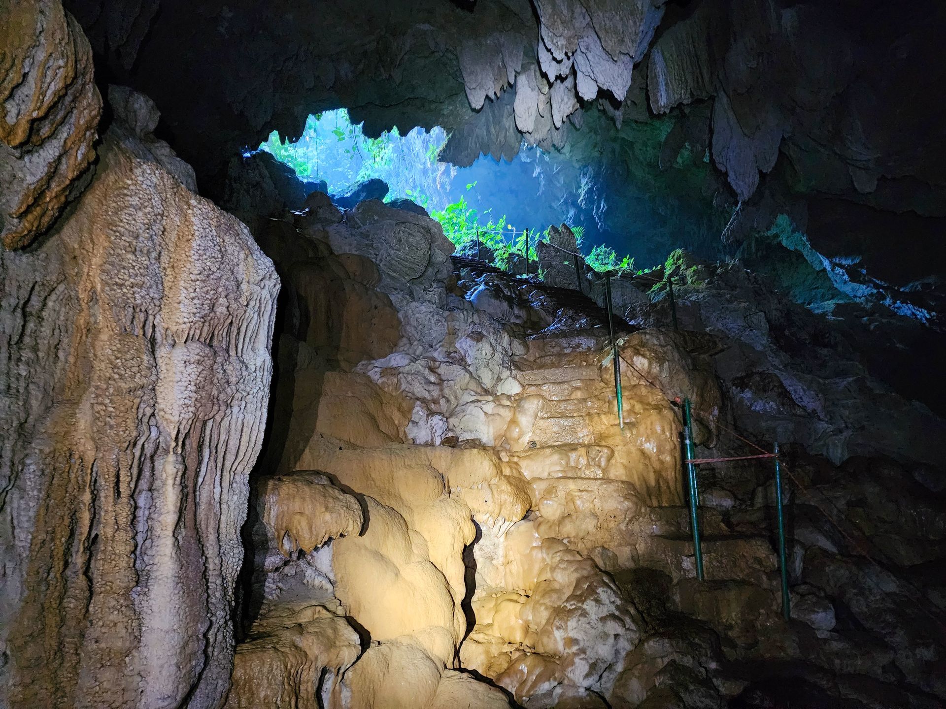 There are stairs leading up to the entrance of St Herman's cave, best tours in Hopkins Village