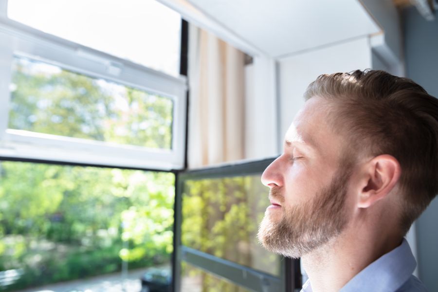 Man Smelling Clean Air