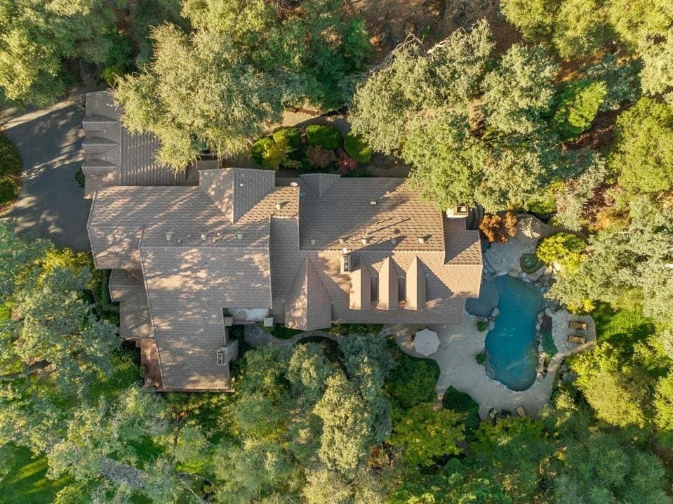 The gated compound sits on five scenic acres in Loomis, near the foothills of the Sierra Nevada Mountains.