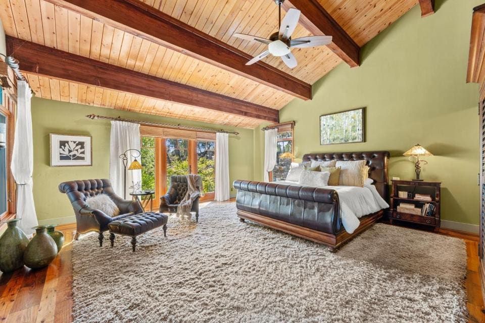 There are four bedrooms and 6.5 bathrooms in the main house. The guest house includes two bedrooms, two full bathrooms plus a loft and kitchen