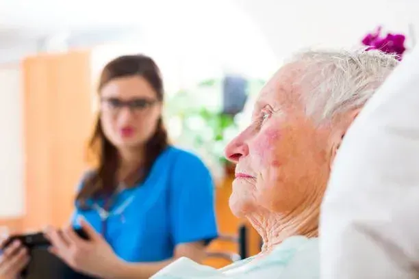 Aide providing supervision in-home care for elderly woman in Kings Point, NY