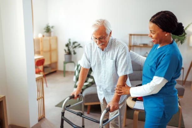home health aide caring for elderly man with kidney disease