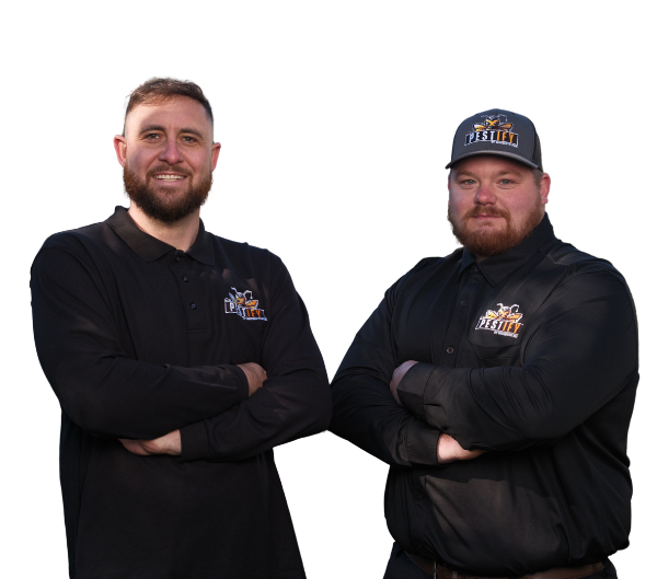 Two men in black collared shirts and company-branded apparel stand against a white background with their arms crossed.
