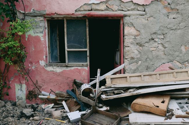 Kent Junk Removal services, WA clearing debris and unwanted materials from an old residential property.
