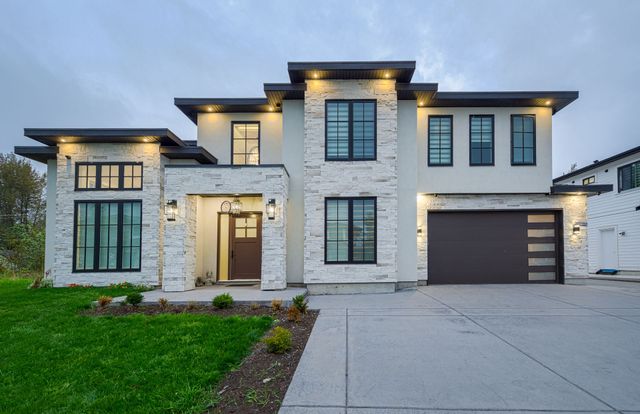 Two-storey home with Rinox Nora Vanilla stone