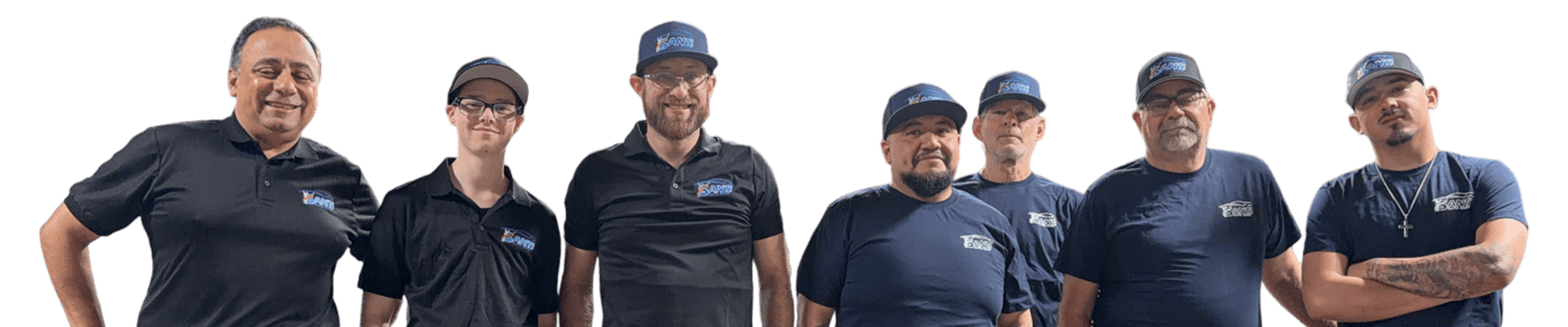 Santi Auto Care team in black-and-navy shirts standing together outdoors, smiling at the camera.