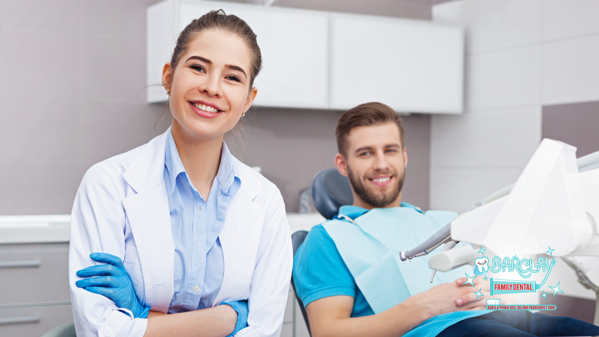 A dentist and a patient are posing for a picture in a dental office.