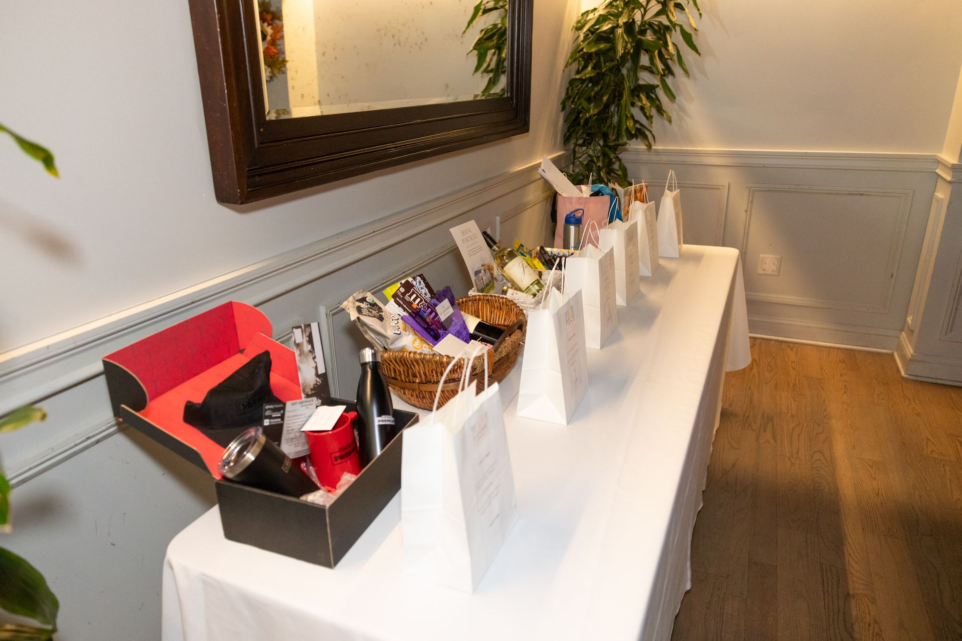 A table with a lot of baskets and boxes on it