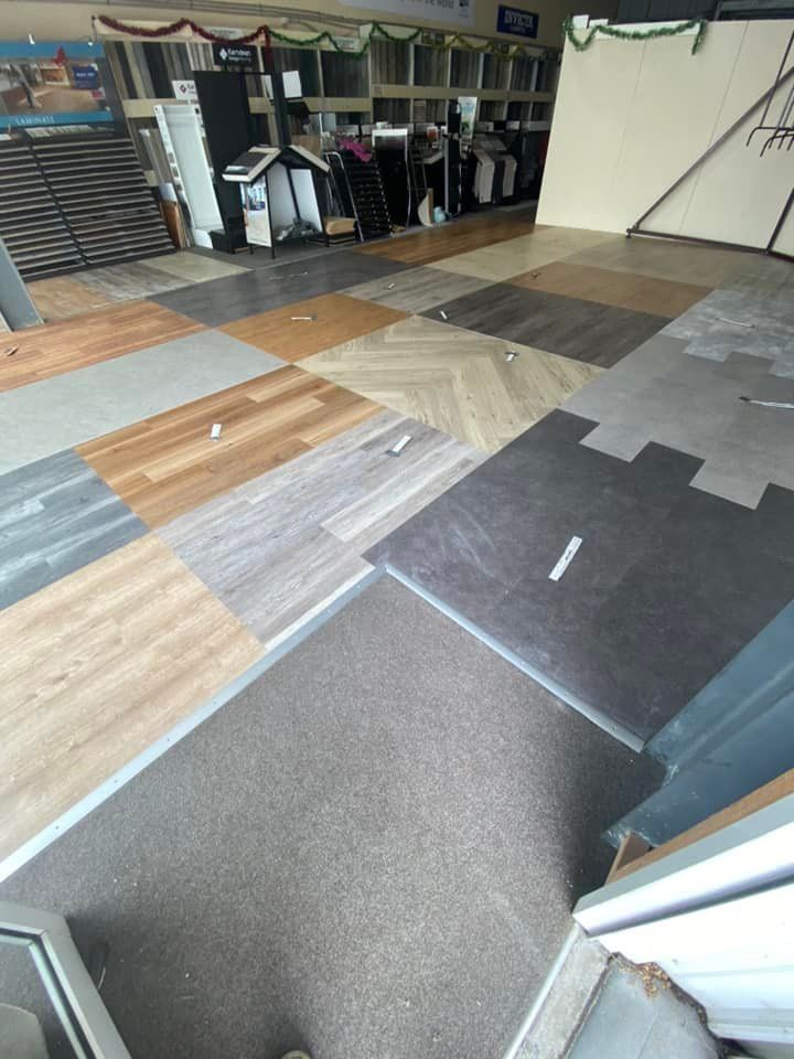 There Are Many Different Types Of Flooring In This Room — Charmhaven Carpets In Charmhaven, NSW