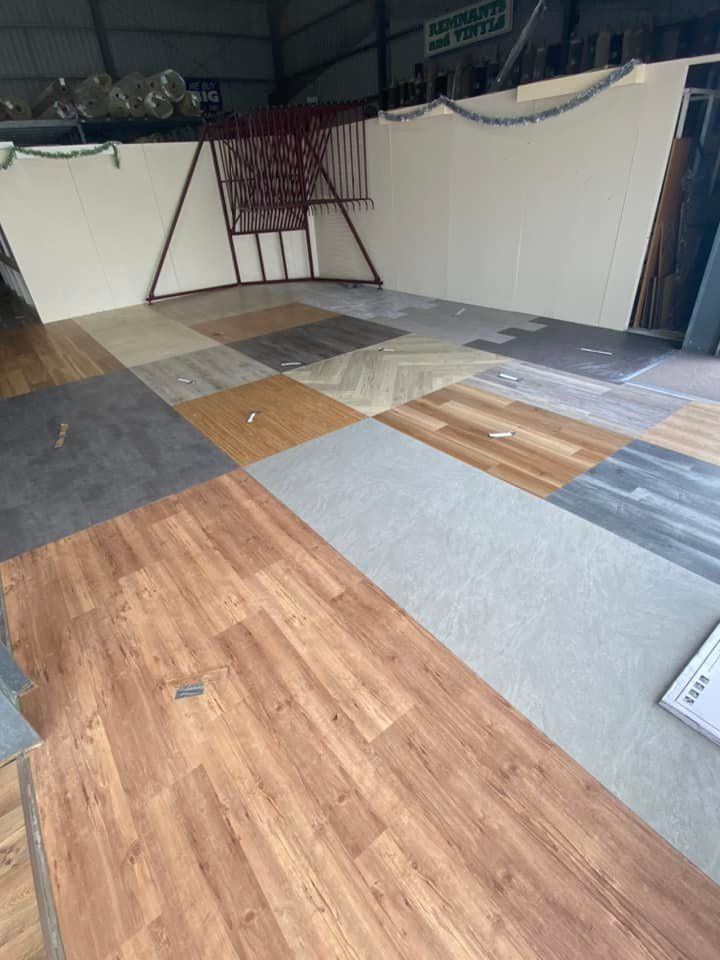 There Are Many Different Types Of Flooring In This Room — Charmhaven Carpets In Charmhaven, NSW