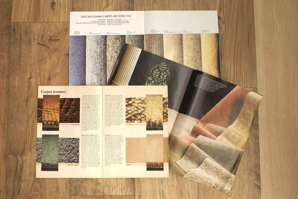 A Book Is Open To A Page That Says' Carpets' On It — Charmhaven Carpets In Charmhaven, NSW