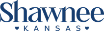 Shawnee Kansas logo with blue text and a heart-shaped dot over the “i” in “Shawnee”
