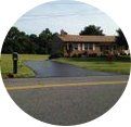 Asphalted Road For Brown House With Man — Baltimore, MD —  E Cooper Contracting