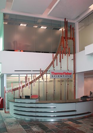The inside of a building with a sign that says thermo fisher scientific