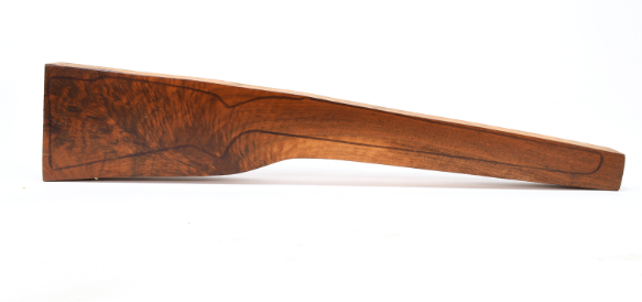 Wooden rifle stock. Brown wood with visible grain against a white background.