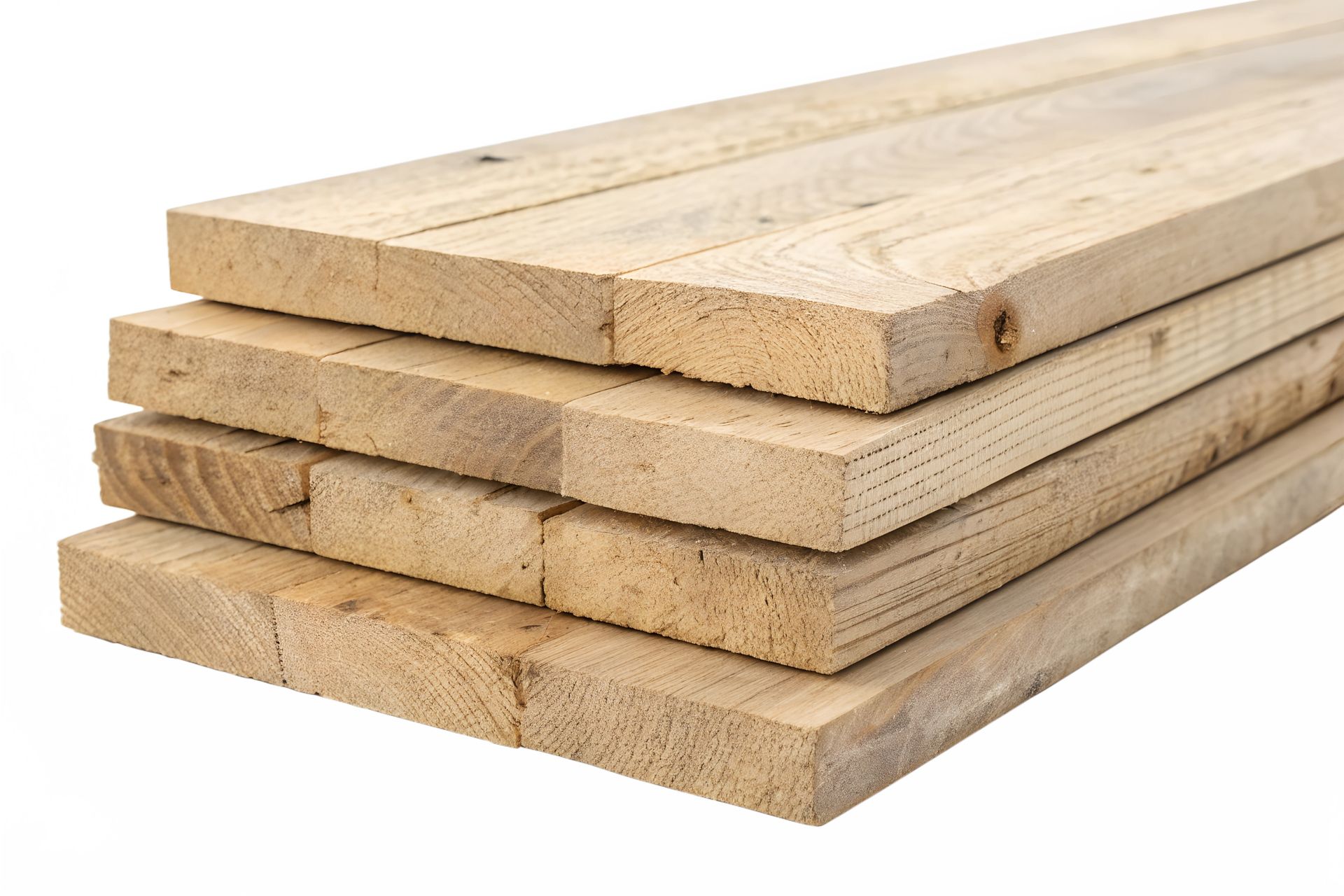 Stack of light-colored wooden planks with visible grain and rectangular shape.