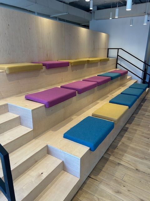 A row of colorful seats on a set of stairs
