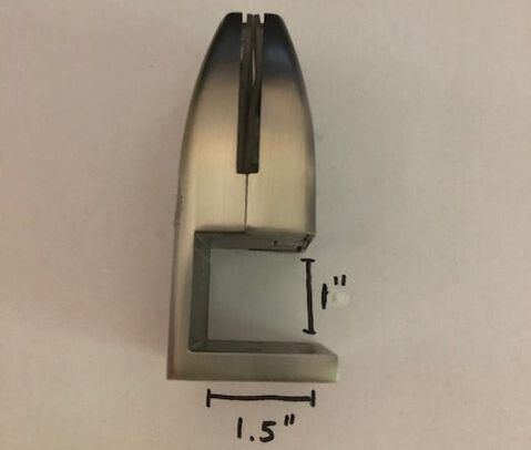 A stainless steel clamp with measurements of 1.5 inches
