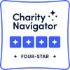 Charity Navigator four-star rating badge with blue stars on a white background