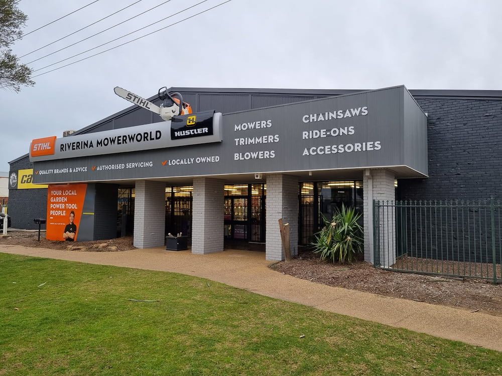 A Store Front With a Sign That Says