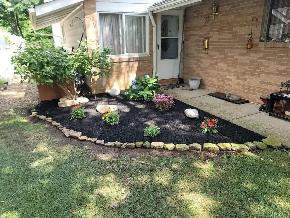 Brick House with a Garden — Northeast OH — Believeland Landscaping and Snow Removal