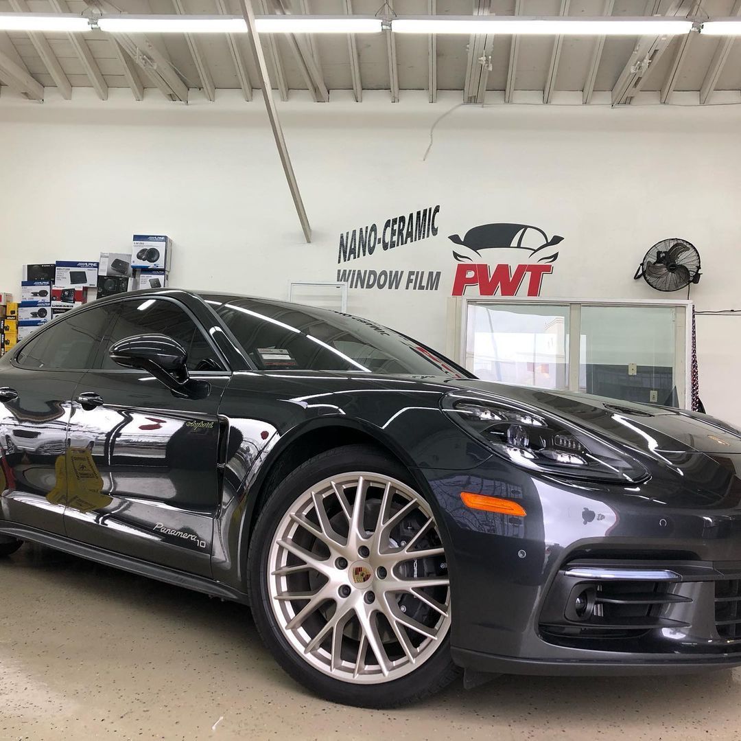 Worker Install Car Paint Protection Film — San Lorenzo, CA — PWT Professional Window Tinting & Car Audio