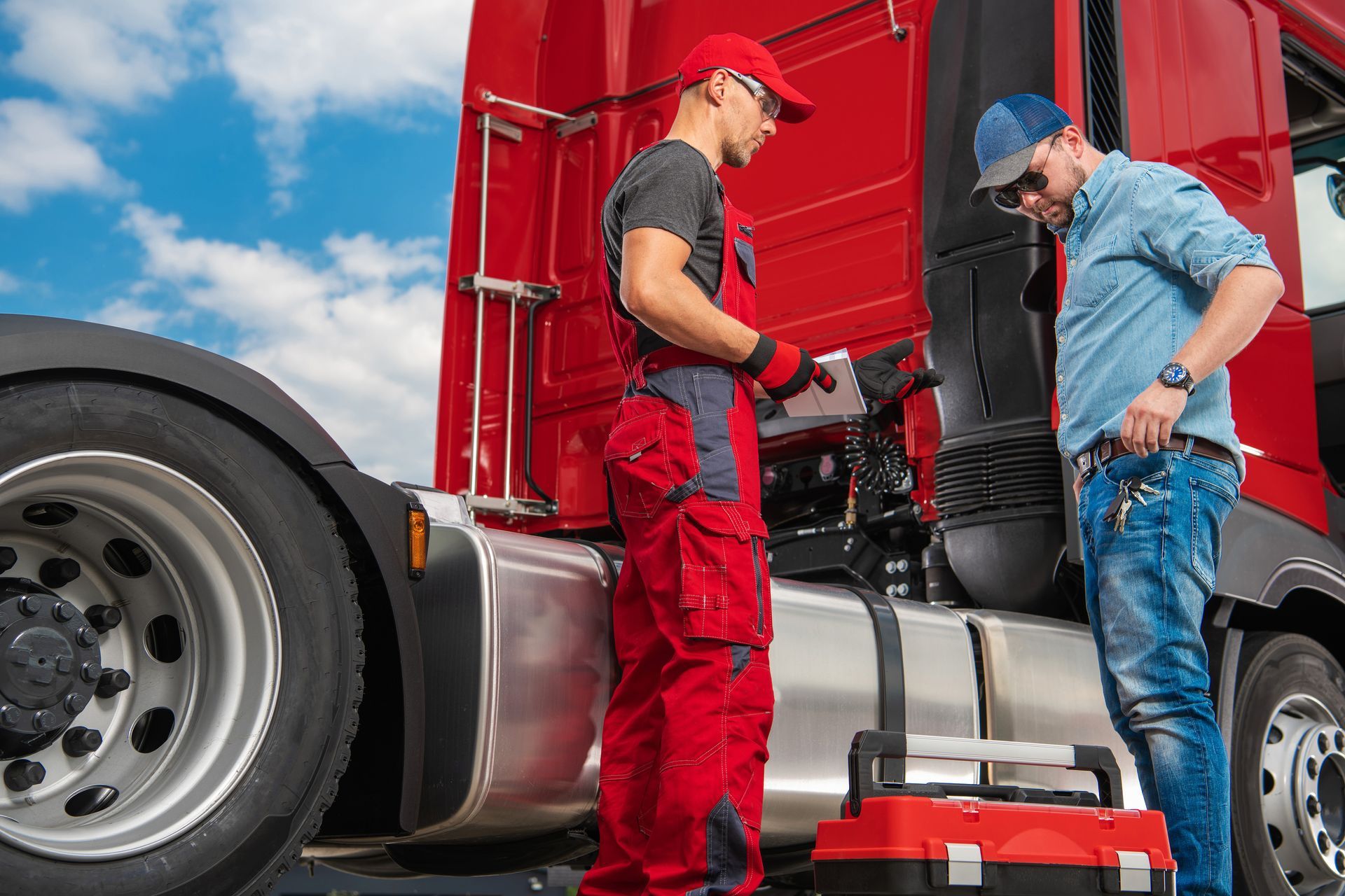 2 truck drivers talking