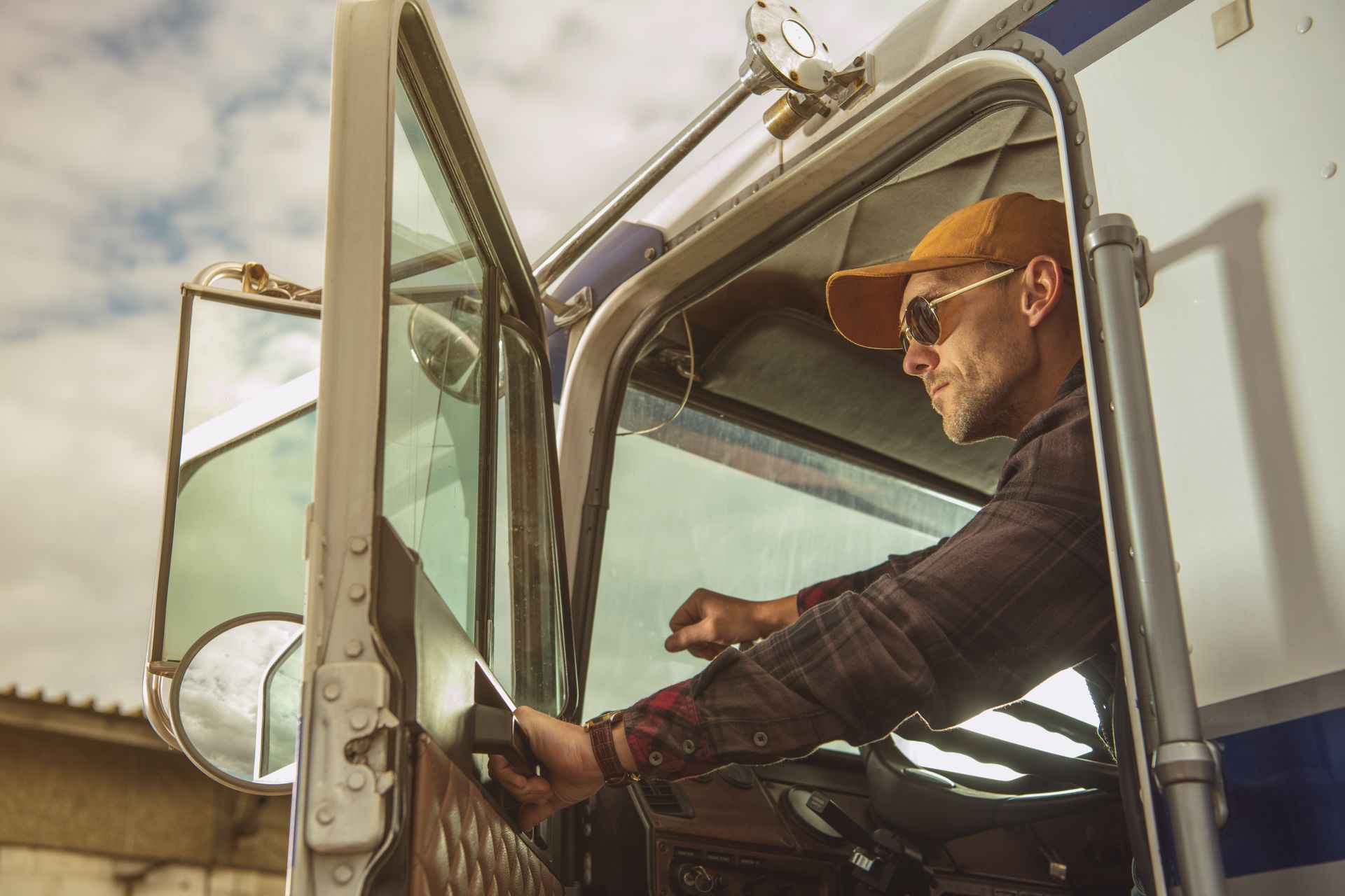 trucker getting into truck