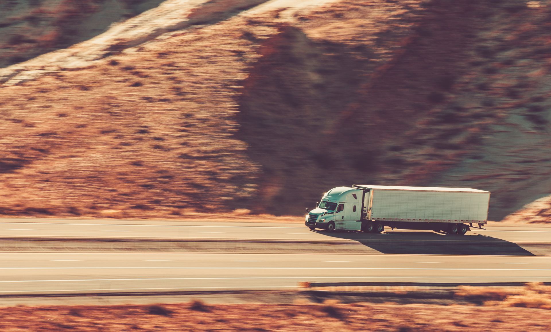 trucking moving down a highway