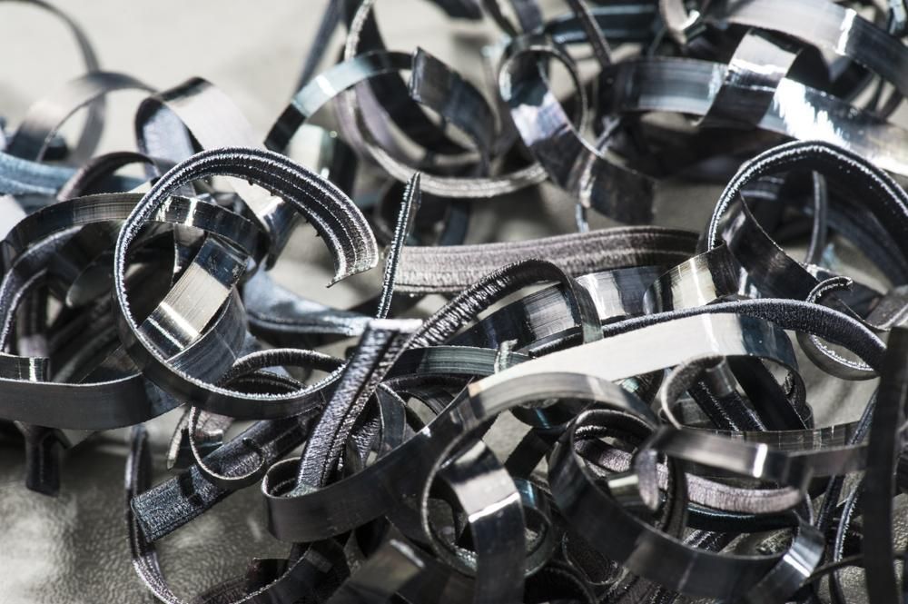 Pile of Shredded Metal is Sitting on a Table — Maryborough Recycling in Torbanlea, QLD