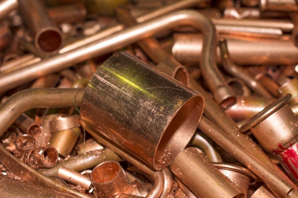 Pile of Copper Pipes and Pieces of Metal — Maryborough Recycling in Biggenden, QLD