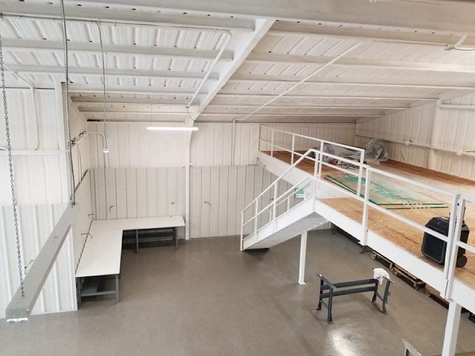 There is a staircase leading up to the second floor of a building.