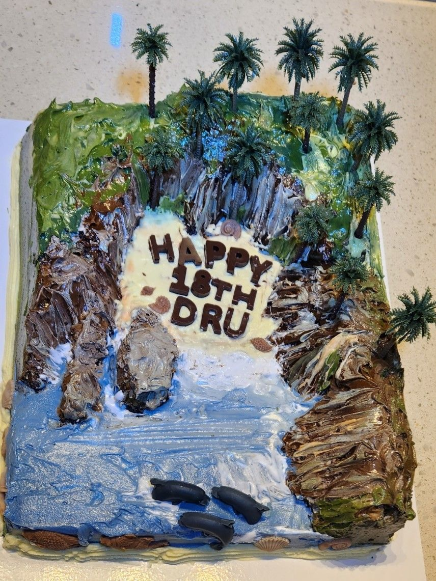 Cake decorated as a beach scene with 