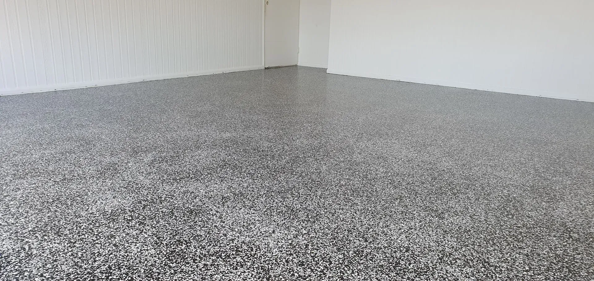 Floor With Aggregate Epoxy Finish, in a Light Color — Keppel Coatings in Pacific Heights, QLD