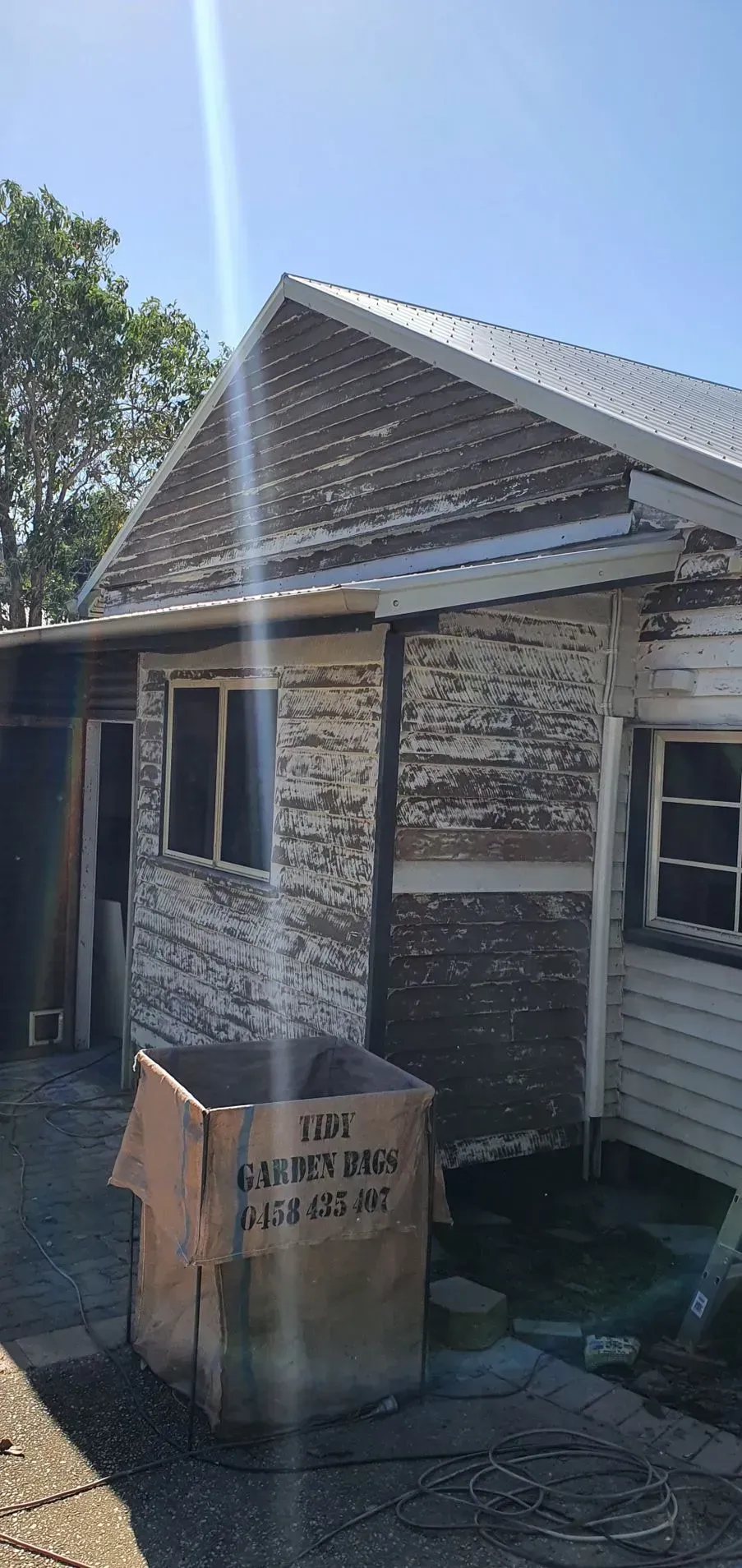 Dilapidated Building With Peeling Paint — Keppel Coatings in Pacific Heights, QLD