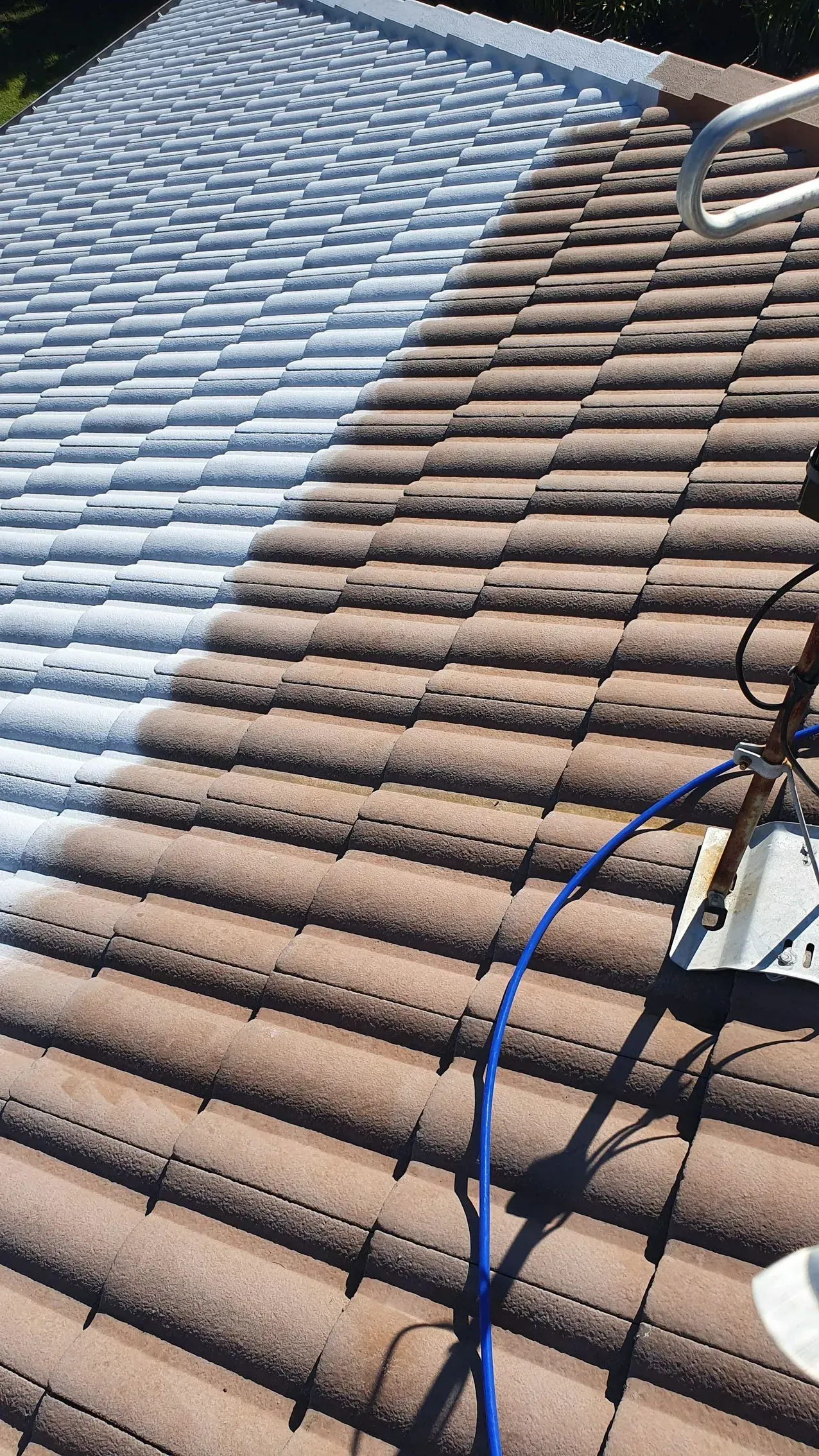 Half-painted Roof Tiles; Light Gray and Brown Tiles — Keppel Coatings in Pacific Heights, QLD