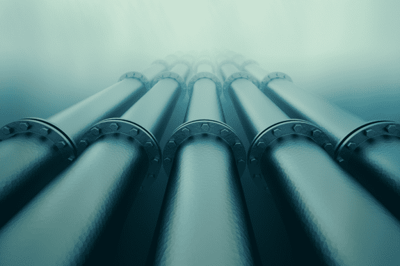 A bunch of pipes are lined up in a row.