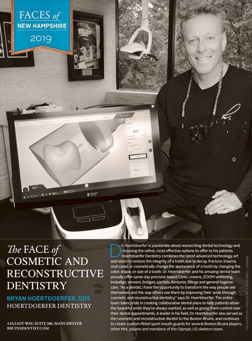 A man stands in front of a computer screen that says faces of cosmetic and reconstructive dentistry