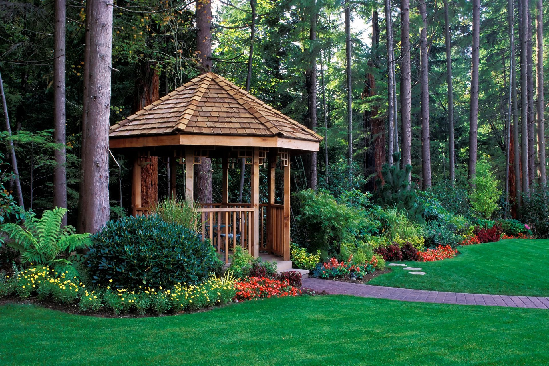Beautiful wooden gazebo surrounded by lush greenery and landscaped garden, representing outdoor stor