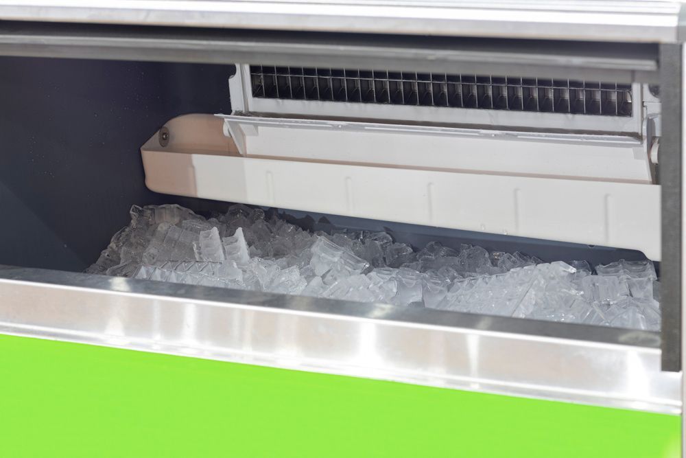 A Container of Ice Is Sitting Inside of A Refrigerator - Townsville Ice Machine in Mount Isa, QLD