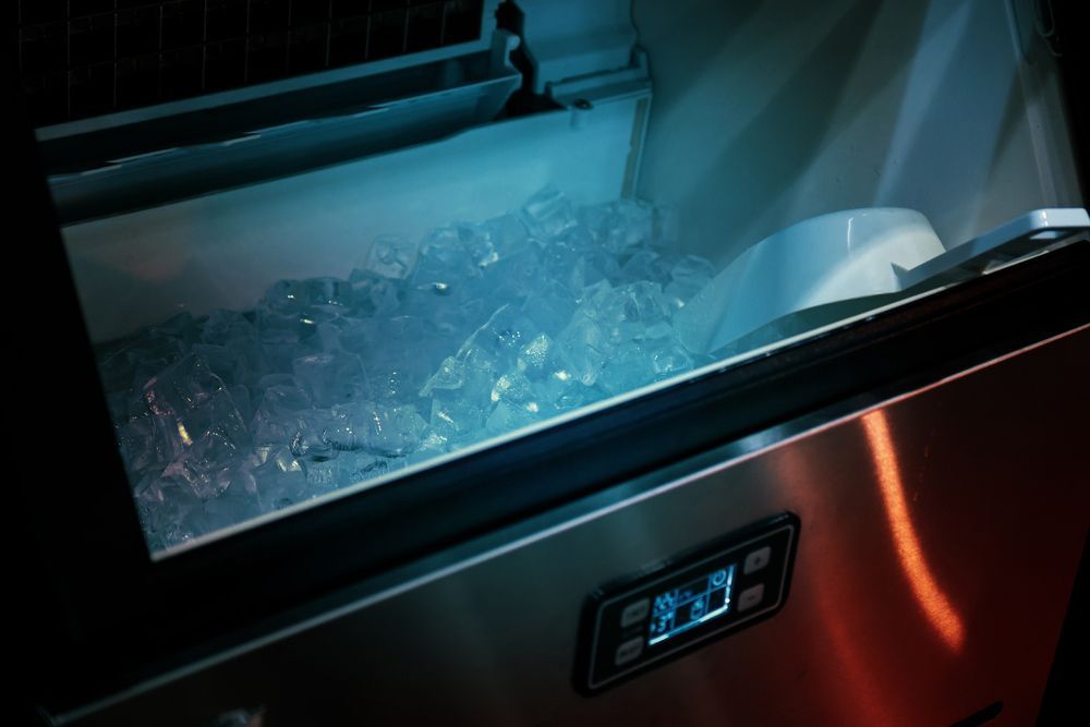 A Stainless Steel Ice Maker Is Filled with Ice - Townsville Ice Machine in Mackay, QLD