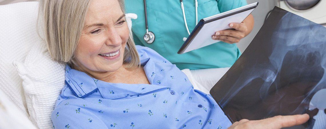 Woman Looking Ultrasound — New York — Star One Home Care Woman Looking Ultrasound — New York — Star One Home Care