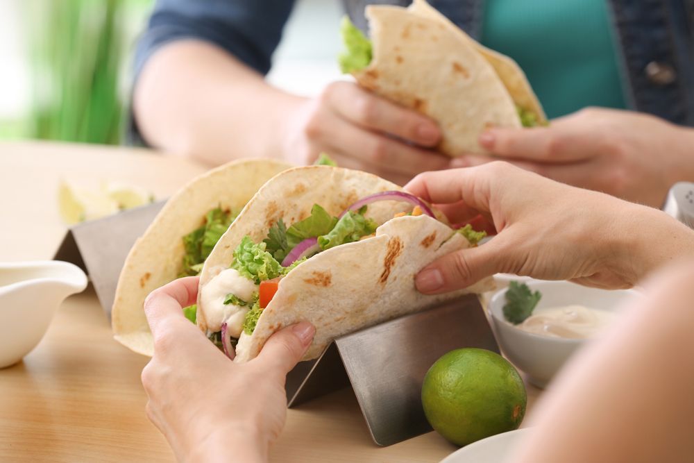 People Eating Tacos