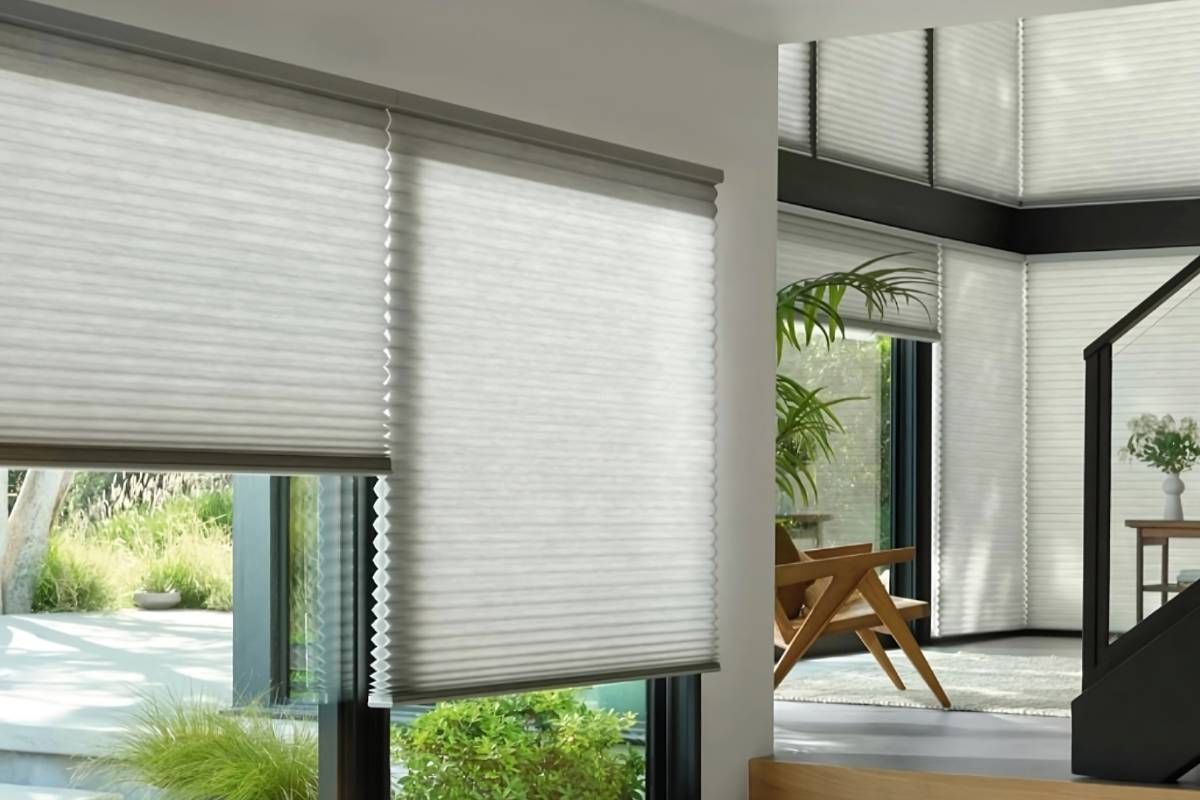 Energy-efficient Hunter Douglas Duette® Cellular Shades on many large windows in a modern home near Houston, TX