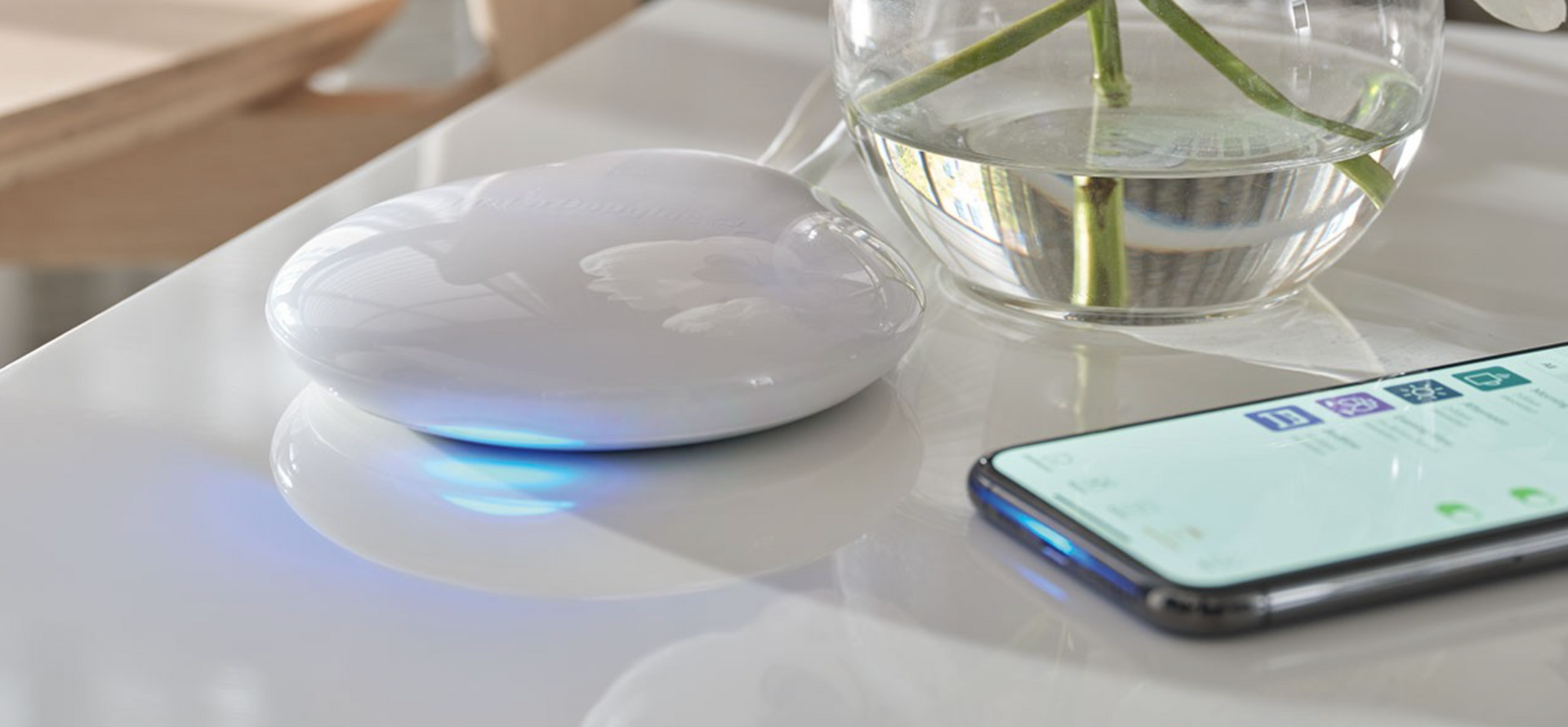 Hunter Douglas PowerView® Automation hub on a kitchen counter.