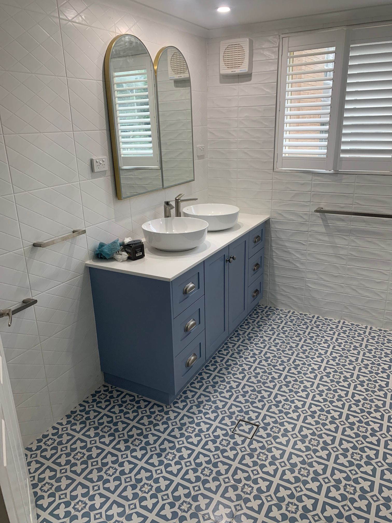 Blue and White Bathroom With Patterned Floor — Port Macquarie Plumbing In Port Macquarie, NSW