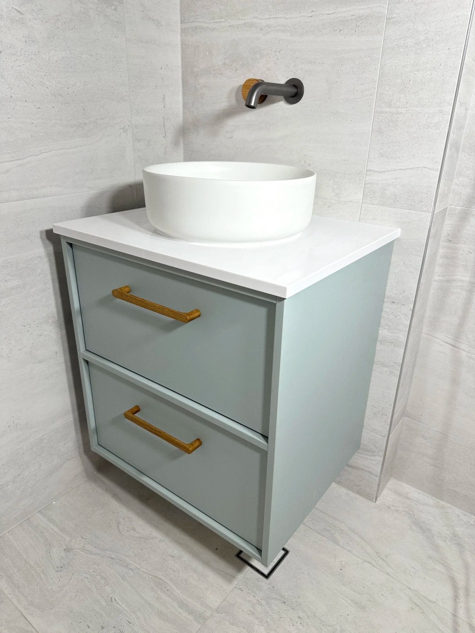 A Modern Light Blue Bathroom Vanity With Two Gold-handled Drawers — Port Macquarie Plumbing In Port Macquarie, NSW