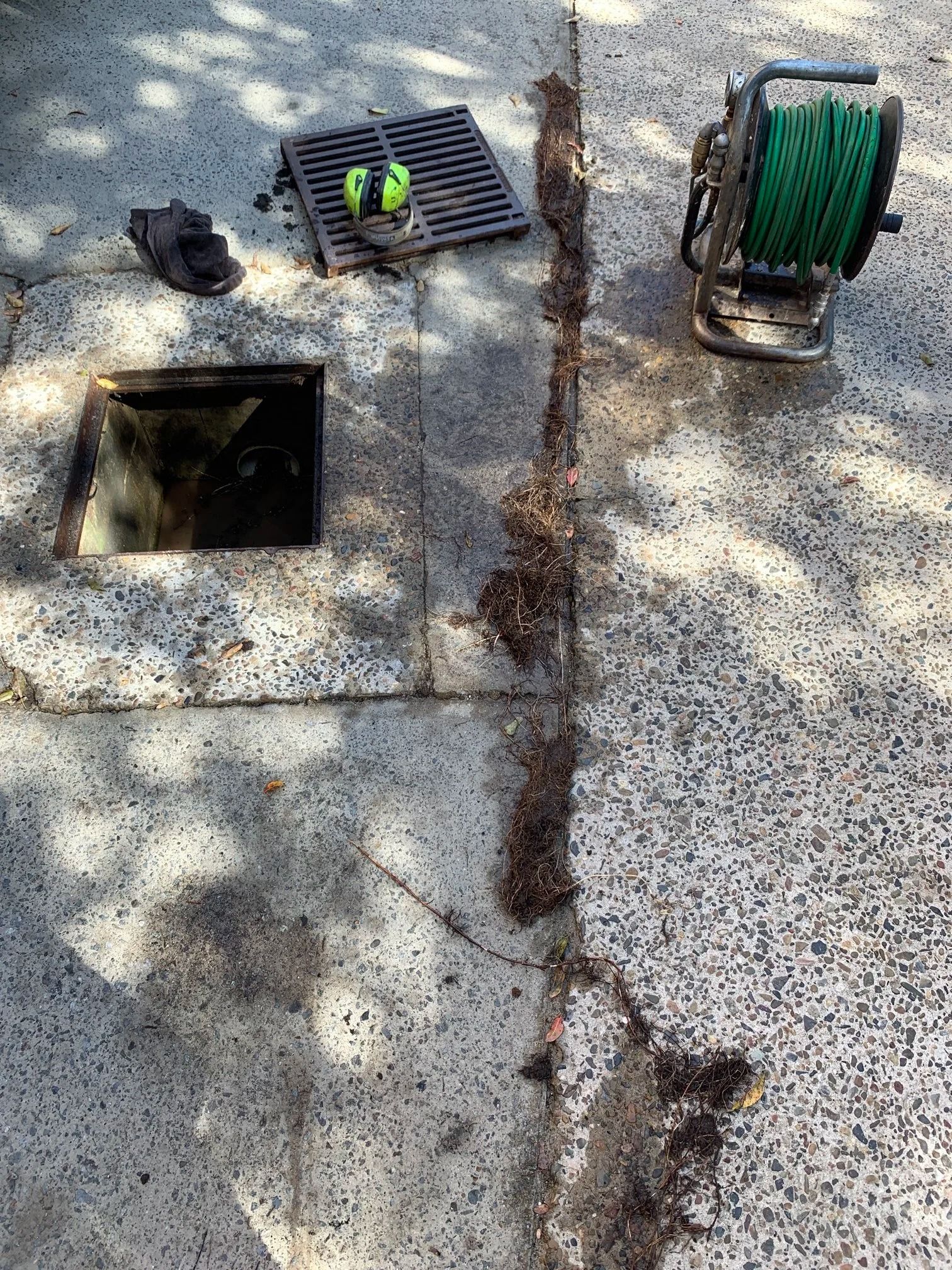 A Drain Access Point With a Removed Grate — Port Macquarie Plumbing In Port Macquarie, NSW