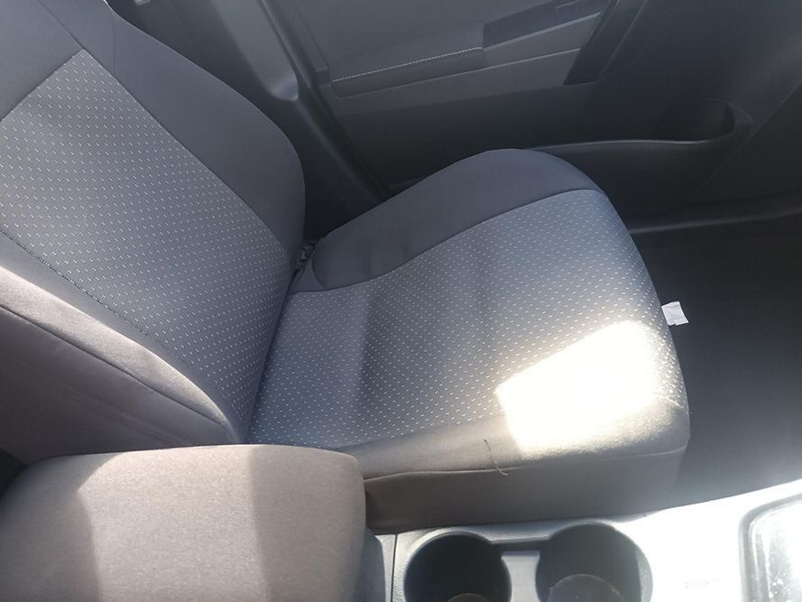 A Car Seat with an Arm Rest and a Cup Holder — South West 4WD Wreckers In Brisbane, QLD 