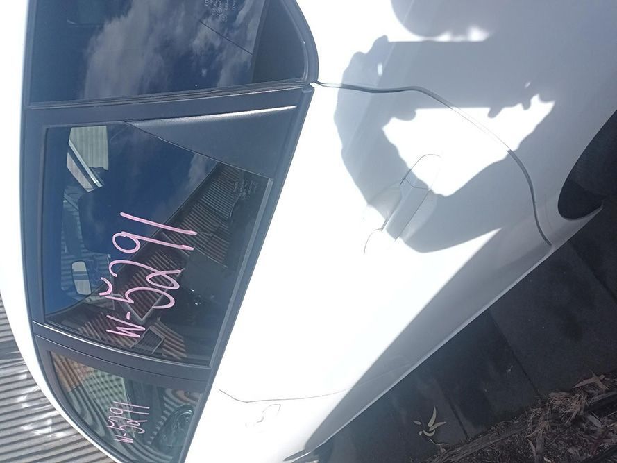 A Close Up of a White Car's Window — South West 4WD Wreckers In Brisbane, QLD